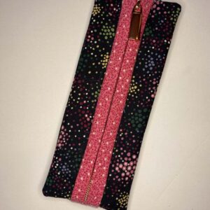 Black Multi color dot with pink binding and rose gold zipper - front