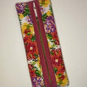 Bright Modern Floral journal case with pink zipper binding and white zipper pull - front view