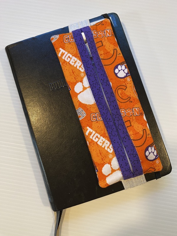 Journal case Clemson University with purple accent displayed on a Bullet Journal