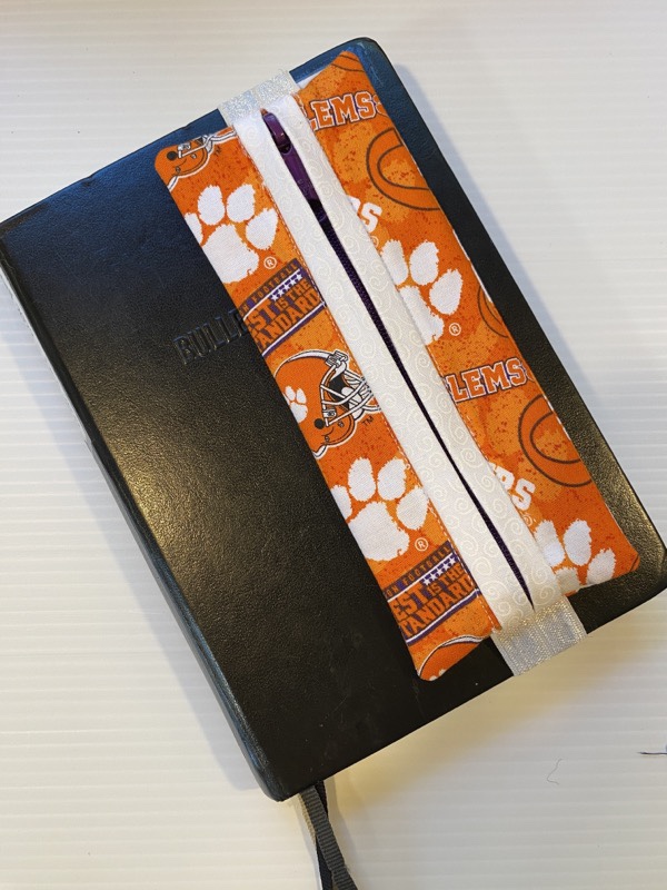 Journal case featuring Clemson University with white accent -Displayed on journal cover