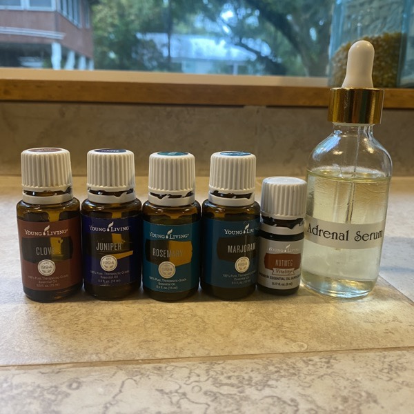 Essential Oils and dropper bottle to add castor oil and essential oils to make adrenal serum.