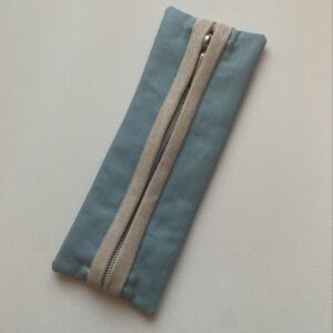 Premium Cotton Fabric in light blue with beige zipper binding and Sliver zipper hardware.